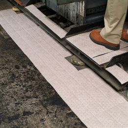 Rouleau à déchirer absorbant